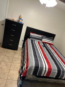 Cama ou camas em um quarto em Next level properties