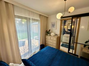 Ένα ή περισσότερα κρεβάτια σε δωμάτιο στο SPA House Wiele Dobrego