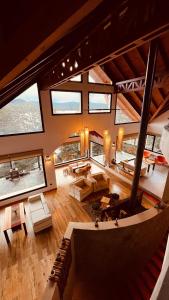 an overhead view of a living room with large windows at Amarras in Villa Pehuenia