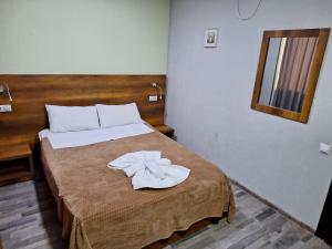 Postelja oz. postelje v sobi nastanitve Hotel Georgian