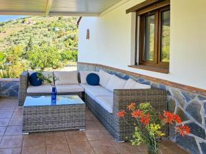 Posedenie v ubytovaní Cortijo Airen