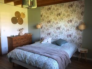 Postel nebo postele na pokoji v ubytování La Bastilac chambre Nature