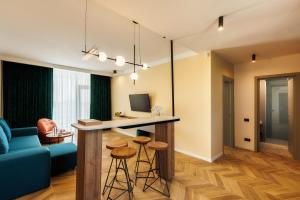 TV a/nebo společenská místnost v ubytování Hypnose Resort - Adult Only 14