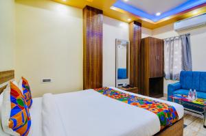Postel nebo postele na pokoji v ubytování HOTEL KANAN INN