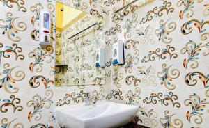 Koupelna v ubytování HOTEL KANAN INN