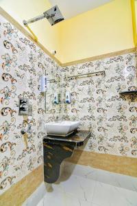 Koupelna v ubytování HOTEL KANAN INN