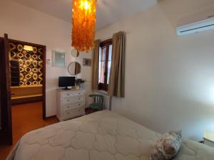 Casa degli Ulivi Etna tesisinde bir odada yatak veya yataklar