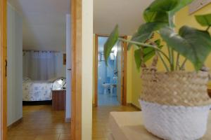 Postel nebo postele na pokoji v ubytování Vacanze Mare Teulada