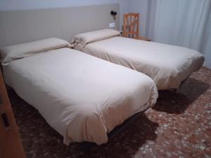 Postel nebo postele na pokoji v ubytování L'Oncle Pere Habitacions