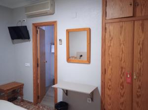 TV a/nebo společenská místnost v ubytování L'Oncle Pere Habitacions