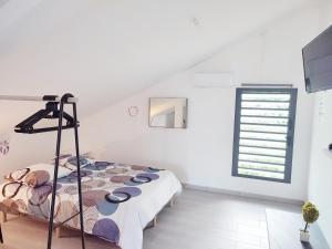 Postel nebo postele na pokoji v ubytování T1 - O' relax
