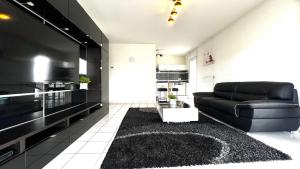 Fotografia z galérie ubytovania HOMEY GENIUS - À 100 m de la douane/Terrasse privée v destinácii Ambilly