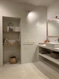 a bathroom with a sink and a mirror at Casa sardine in Cassis +42 photos