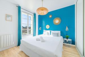 Ένα ή περισσότερα κρεβάτια σε δωμάτιο στο Le jardin d'hiver