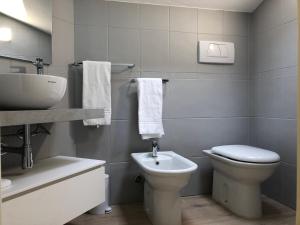 Koupelna v ubytování PASUBIO QUATTRO + 19 fotografií