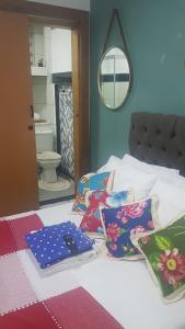 FLAT C\Sala/Cozinha/Banheiro tesisinde bir odada yatak veya yataklar