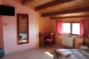 Postel nebo postele na pokoji v ubytování Il Rifugio di Pan