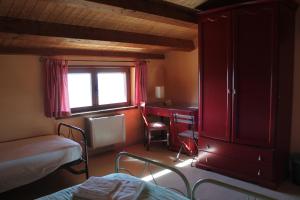 Postel nebo postele na pokoji v ubytování Il Rifugio di Pan