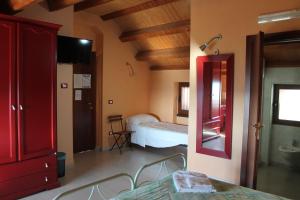 Postel nebo postele na pokoji v ubytování Il Rifugio di Pan