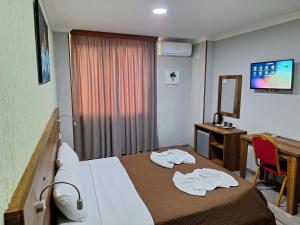 Postelja oz. postelje v sobi nastanitve Hotel Georgian