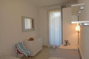 A bed or beds in a room at Nice apartment with swimming pool - Beahost