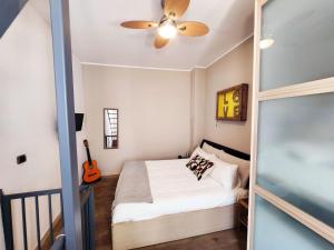 Ένα ή περισσότερα κρεβάτια σε δωμάτιο στο Nido felice