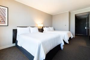 Cama o camas de una habitación en Holiday Inn Santiago - Airport Terminal by IHG