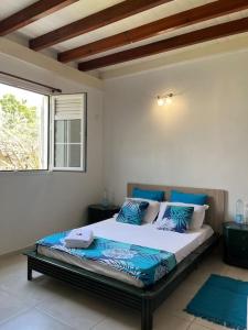 Ένα ή περισσότερα κρεβάτια σε δωμάτιο στο Villa Eldorado - 6 à 10 personnes