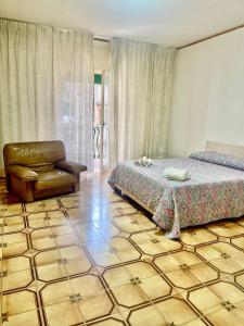 A bed or beds in a room at Rosa's house