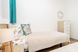 Posteľ alebo postele v izbe v ubytovaní Jose Hurtado Apartamento