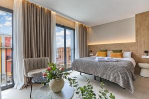 Postel nebo postele na pokoji v ubytování El Pont Alicante Apartments