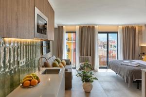 Postel nebo postele na pokoji v ubytování El Pont Alicante Apartments