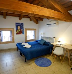Postel nebo postele na pokoji v ubytování Guesthouse Villa Fabris + 24 fotografií