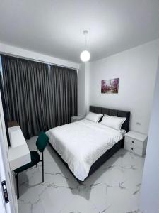 Postel nebo postele na pokoji v ubytování Prime Luxury Apartments