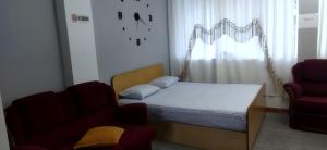 Postel nebo postele na pokoji v ubytování New Apartament
