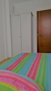 Posteľ alebo postele v izbe v ubytovaní Piso Arrecife Centro + 9 fotografií