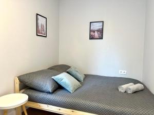 Postel nebo postele na pokoji v ubytování MMRent Lake Room