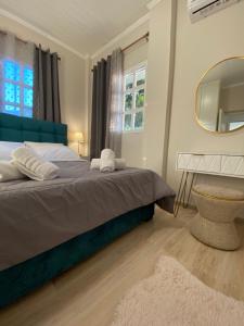 Postel nebo postele na pokoji v ubytování Diamond Suite