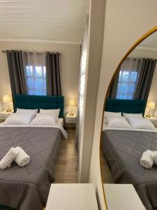 Postel nebo postele na pokoji v ubytování Diamond Suite