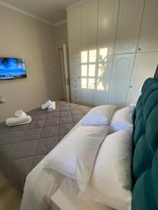 Postel nebo postele na pokoji v ubytování Diamond Suite