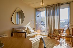 a living room with a couch and a table at Oporto Maison Anselmo in Porto