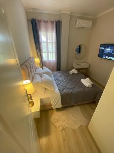 Postel nebo postele na pokoji v ubytování Diamond Suite