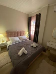 Postel nebo postele na pokoji v ubytování Diamond Suite