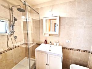 a bathroom with a shower and a sink at Domus Chiara in Monopoli +16 photos