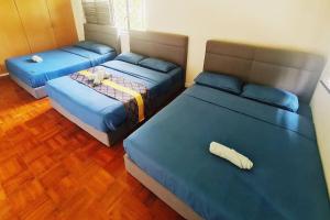 Ліжко або ліжка в номері Bali Modern Style Villa up to 20pax in KL