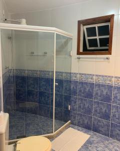 Ванная комната в Pousada Enseada da Vila