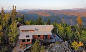 an aerial view of a house on top of a mountain at 273 Fallen Rock in Tabernash