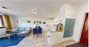 Ruang duduk di Aurora Apartman