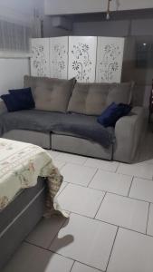 Łóżko lub łóżka w pokoju w obiekcie Linda Casa Inteira c/ Acesso a Praia do Campeche