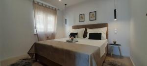 Postel nebo postele na pokoji v ubytování Apartments San Paulo